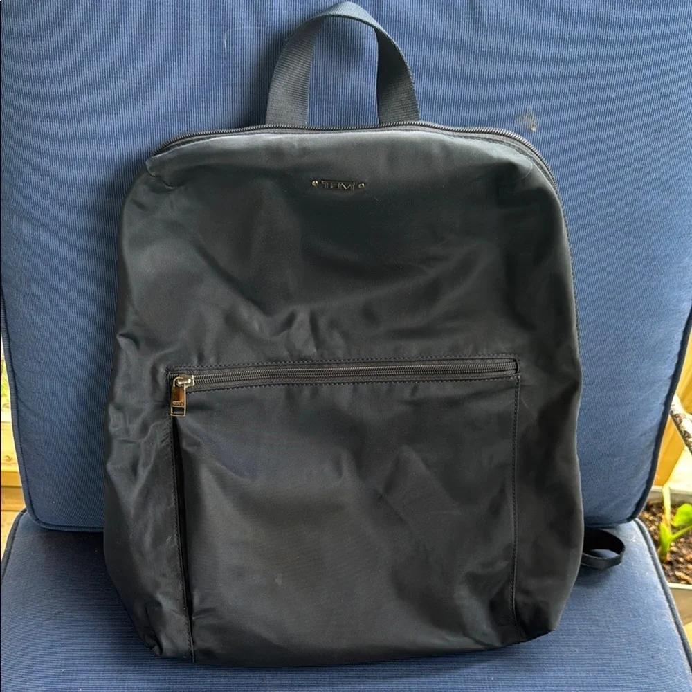 Tumi Black Backpack with Minimalist Design and Durable Material